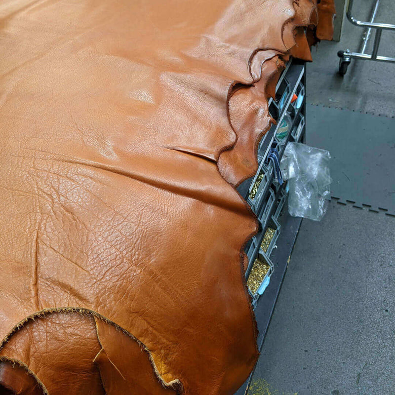 High-quality leather for crafting made in USA handbags, showcasing the texture of premium materials.
