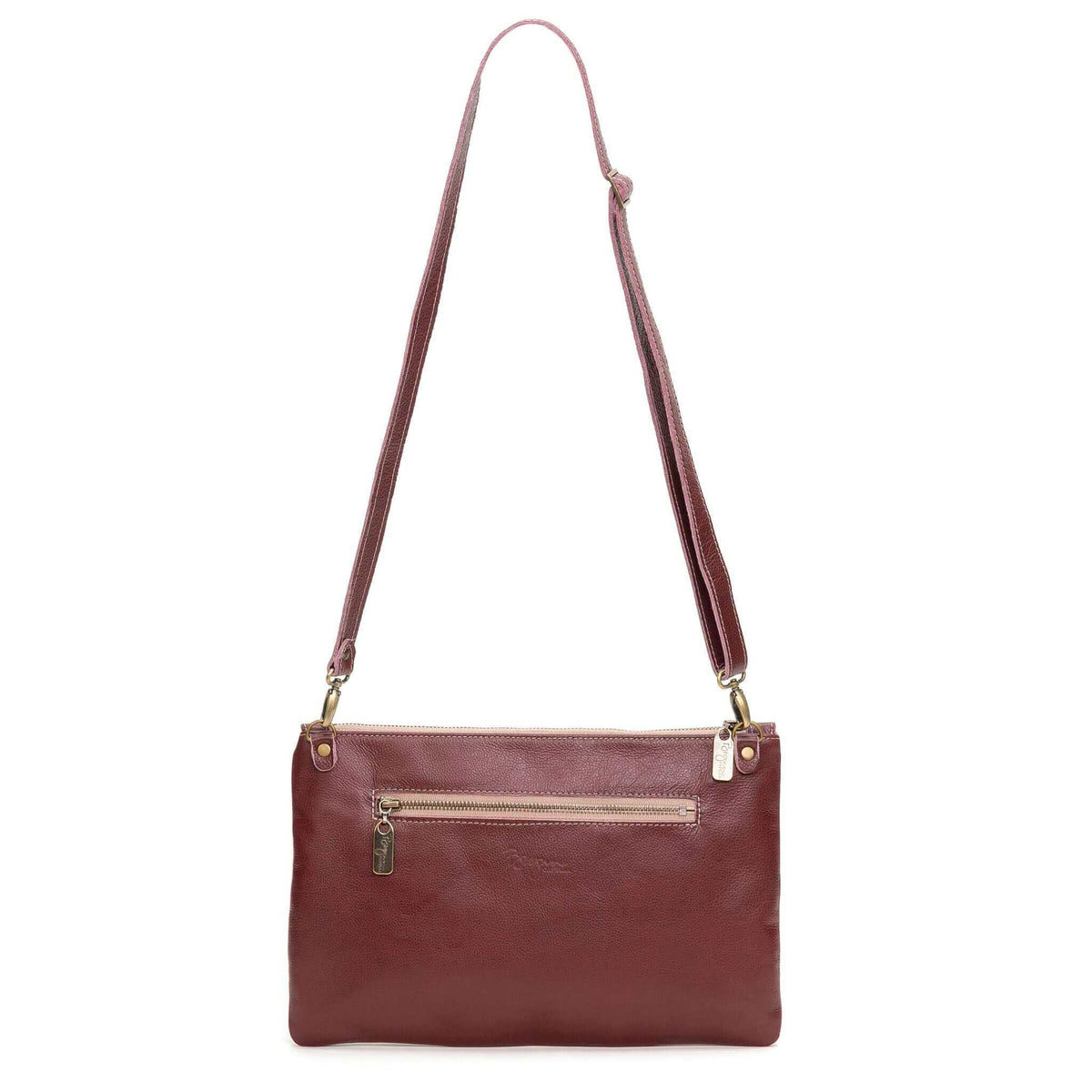 Back view of Studded crossbody bag in plum full-grain leather convertible clutch-to-crossbody with detachable strap